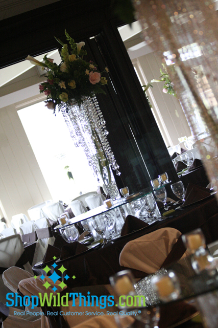 Sooooo it's very easy to use our chandeliers on top of tall glass vases or