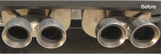 Image shows chrome exhaust tips before using Menzerna Polishig Cream.