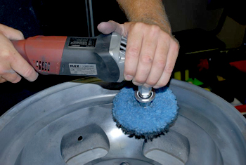 Apply Wolfgang Metallwerk Fine Aluminum Polish with a blue wool pad.