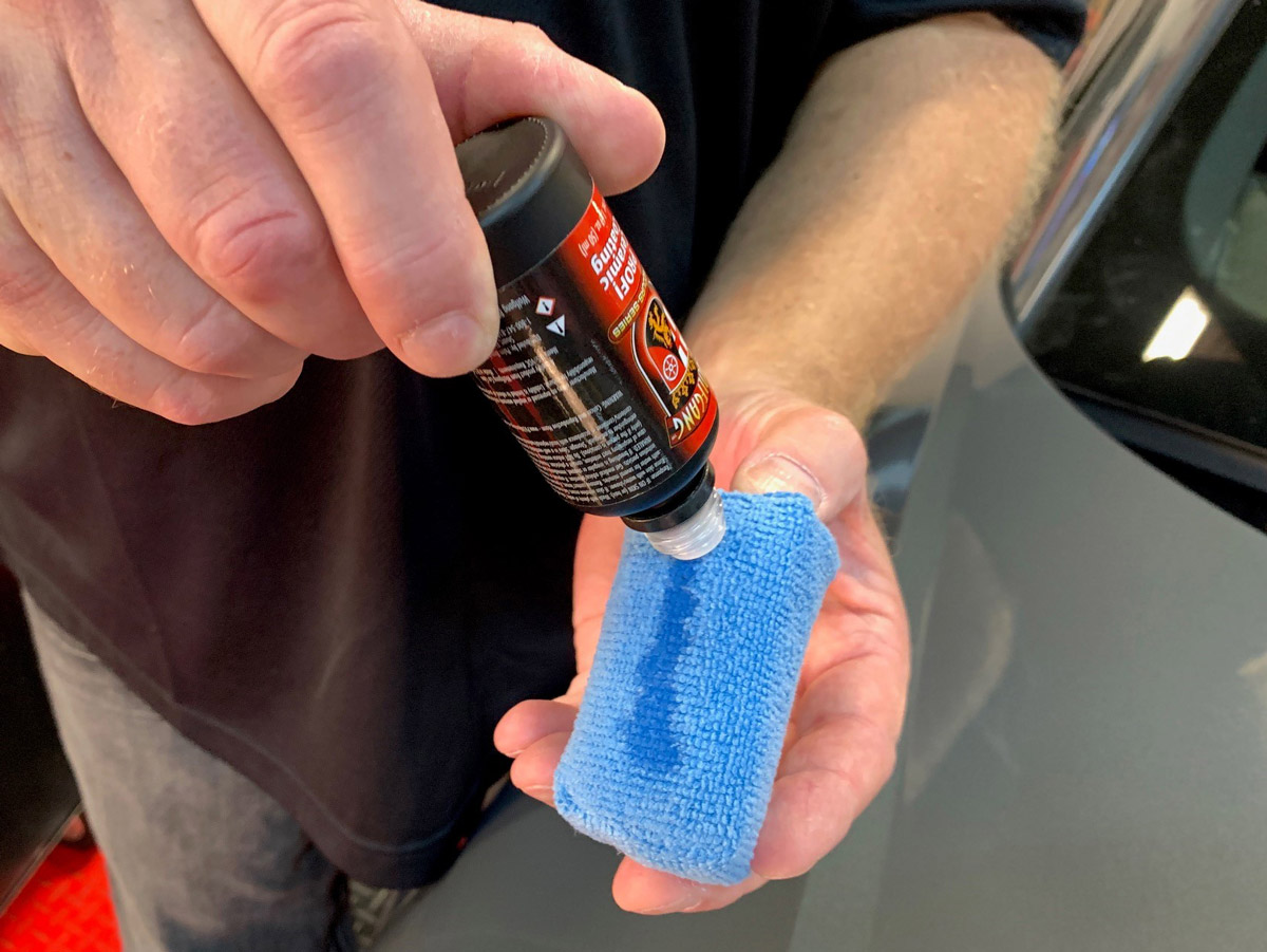 Apply a thin line of Wolfgang PROFI Ceramic Coating to a small microfiber applicator.