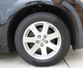 You can see the difference in color of the side treated with Wolfgang Black Diamond Tire Gel and the untreated side.
