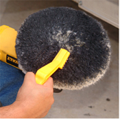 Use a Pad Conditioning Brush to clean wool pads.