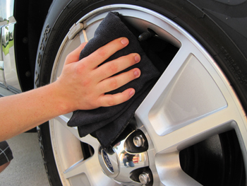 Dry alloy wheels with a microfiber towel.