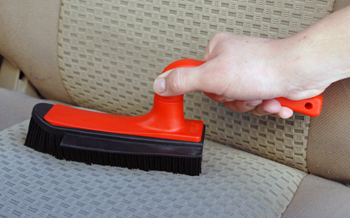German Upholstery Brush & Squeegee removes pet hair and dirt.