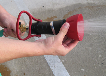 Turn the top of the High Flow Fire Hose Nozzle to adjust the flow.