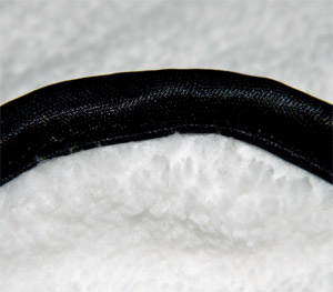 The Artic White Microfiber Towel features a super soft silk border