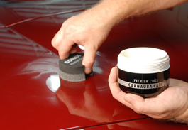 Wipe wax onto one section of paint at a time.