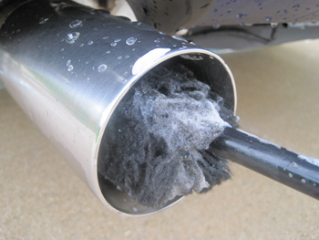 Use the large Wheel Woolie to clean the exhaust tip.