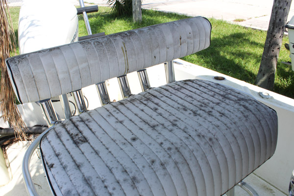 Neglected boat seat with mildew stains