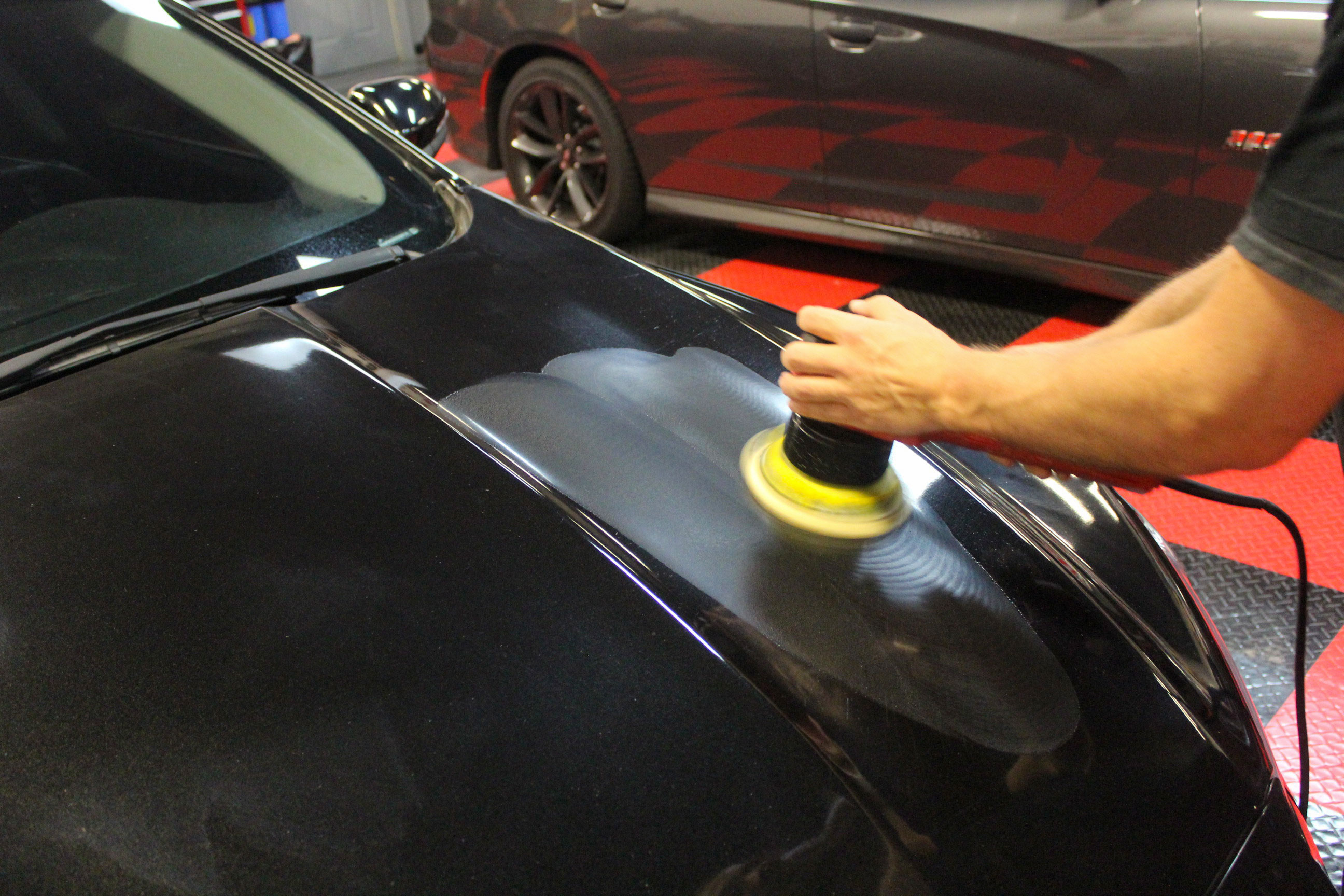 By shining the flashlight on the paint and looking at the perimeter of the on the light, we will be able to get a good view of the severity of the scratches, swirls, and defects in the paint.