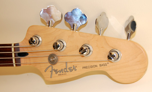 Fender Precision headstock before aging with UV curing lights