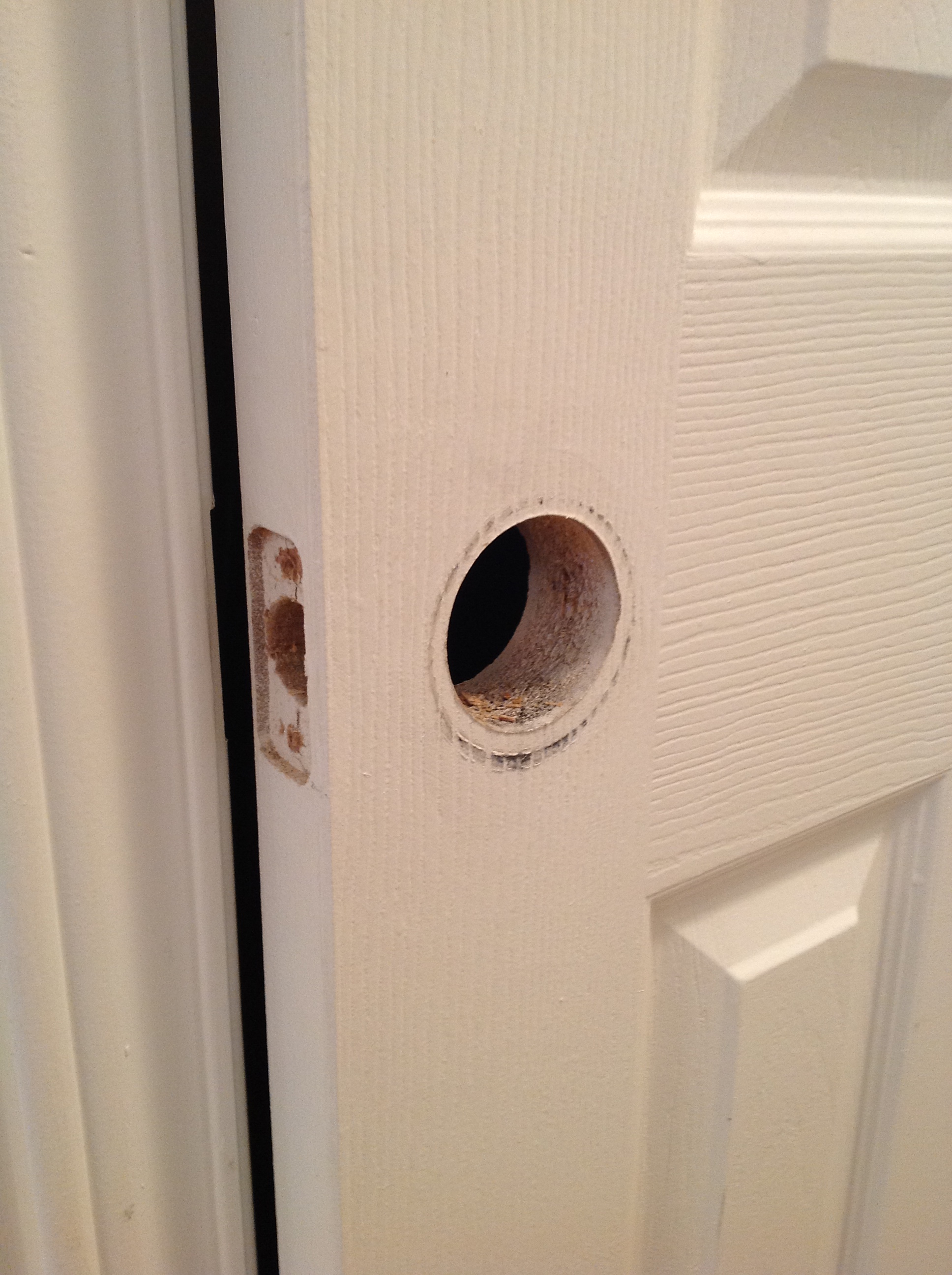 Door slab without a door knob or lever
