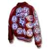 This image displays a custom red virgin wool body and red leather sleeve varsity letterman jacket along with a large number of custom letterman patches. This varsity jacket has a many different style of chenille patches that have a good deal of upgrades to them. This jacket was created by customchenillepatches.com as a hall-of-fame letterman jacket package.